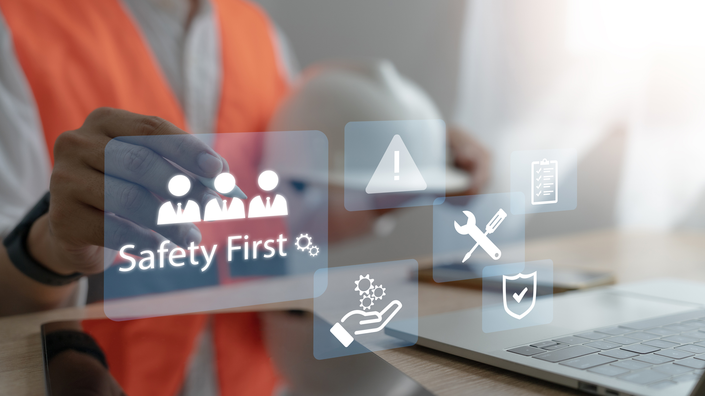 safety first image hardhat and computer